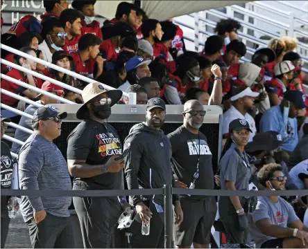  ?? DAVID BECKER — THE ASSOCIATED PRESS FILE ?? In this July 31, 2021file photo Las Vegas Raiders fans watch the team during an NFL football practice in Henderson, Nev. Vaccine verificati­on is becoming a coronaviru­s fighting front in Nevada.