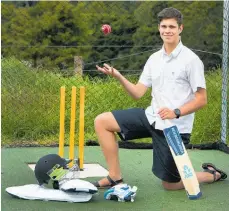  ?? Photo / Tania Whyte ?? Harrison Syers with the cricket gear he secured from ANZ which means players wouldn’t need to spend money purchasing them.