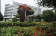  ?? THE ASSOCIATED PRESS ?? This photo shows the headquarte­rs of Equifax Inc. in Atlanta. Equifax expects the financial impact from a massive data breach earlier in 2017 to linger and weigh down fourth-quarter results.