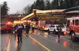  ?? — AP ?? This photo provided by Washington State Patrol shows an Amtrak train that derailed south of Seattle on Monday. Authoritie­s reported ‘ injuries and casualties of several people.’ The train derailed about 40 miles south of Seattle before 8 am, spilling...