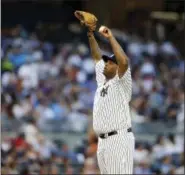  ?? KATHY WILLENS — THE ASSOCIATED PRESS ?? Yankees starting pitcher CC Sabathia reacts after allowing John Hicks’ home run.