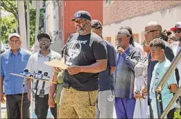  ?? Paul Buckowski / Times Union ?? Trinity Alliance will receive funds to pay for outreach workers. At center is Jerome Brown of Albany 518 SNUG, a Trinity Alliance program.
