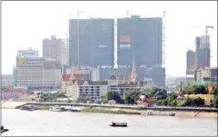  ?? MOEUN NHEAN ?? Real estate developmen­ts in the capital – many of them funded by Chinese investors – have changed Phnom Penh’s skyline. Critics say the real estate boom has increased the likelihood of money laundering.
