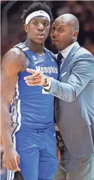  ?? BRIANNA PACIORKA/NEWS SENTINEL ?? Dec. 14, 2019: Memphis head coach Penny Hardaway speaks to Memphis center Malcolm Dandridge (23) during a basketball game between Tennessee and Memphis at Thompson-boling Arena in Knoxville. Memphis won the game 51-47.