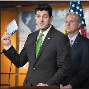  ?? AP/J. SCOTT APPLEWHITE ?? House Speaker Paul Ryan, with help from House Majority Leader Kevin McCarthy (right), uses tax day to talk about passage of the Republican tax overhaul. Ryan said the House will vote on making the individual tax cuts in the bill permanent. “Tax...