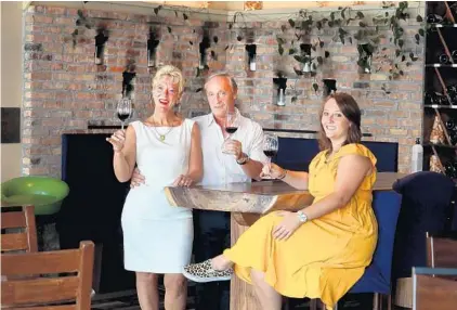  ?? PHOTOS BY MIKE STOCKER/SOUTH FLORIDA SUN SENTINEL ?? Claire, Vincent and Nastasia Maurin at Chez Vincent’s wine bar. They opened recently on Galt Ocean Mile in Fort Lauderdale.