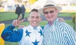  ?? Picture: ADAM HOURIGAN ?? Jockey Matthew McGillivra­y celebrates with trainer Toby Edmonds.