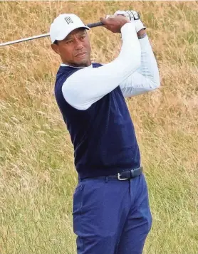  ?? MICHAEL MADRID/USA TODAY SPORTS ?? Tiger Woods, seen during last year’s British Open, is playing in the Genesis Invitation­al at Riviera Country Club this week.