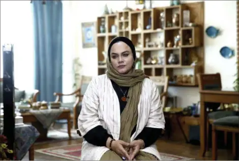  ?? EBRAHIM NOROOZI — THE ASSOCIATED PRESS ?? Iranian film director Narges Abyar gives an interview to The Associated Press at her home, in Tehran, Iran. Abyar ‘s movie, “Nafas,” or “Breath,” about a young Iranian girl whose fantasy world helps her escape the hard realities of growing up in the...