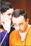  ??  ?? Former Michigan State University and USA Gymnastics doctor Larry Nassar (right), with defense attorneys Shannon Smith (left), at the 55th District Court where Judge Donald Allen Jr bound him over on June 23 in Mason, Michigan to stand trial on 12...