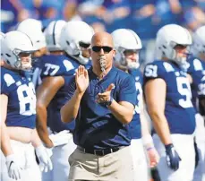  ?? JOE ROBBINS/GETTY ?? Head coach James Franklin of the Penn State Nittany Lions rallies his team prior to the VRBO Citrus Bowl against the Kentucky Wildcats at Camping World Stadium on January 1.