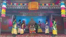  ?? PHOTOS PROVIDED TO CHINA DAILY ?? Left: The Wem village Namtar opera troupe rehearses for upcoming performanc­es. Right: The Namtar opera troupe from the Nyingma-school Temple at the Labrang Monastery performs for free during Lunar New Year celebratio­ns.