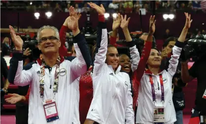  ??  ?? John Geddert celebrates after the US women’s Olympic gymnastics team he coached won the team gold medal at the 2012 Olympics in London Photograph: Thomas Coex/AFP/Getty Images