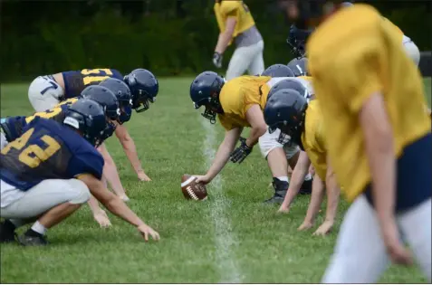  ?? BY JOE BOYLE JBOYLE@DIGITALFIR­STMEDIA.COM @BOYLERALER­TTROY ON TWITTER ?? Averill Park offensive and defensive lines meeting up during preseason training camp at Averill Park High School.