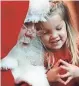  ?? SENTINEL FILES JOURNAL ?? In a quiet voice, Jaylin Gillstrom, 3, of Hartland tells Santa that she’d like a castle for Christmas, at Brookfield Square Mall in 2009.