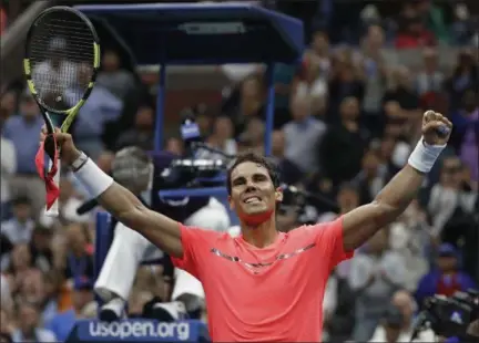  ?? ADAM HUNGER — ASSOCIATED PRESS ?? Rafael Nadal celebrates after winning his match against Andrey Rublev, during the quarterfin­als of the U.S. Open on Wednesday.