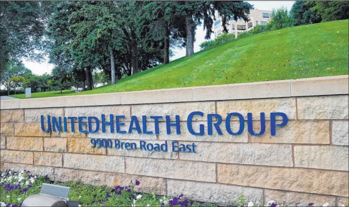  ?? Jim Mone The Associated Press file ?? Federal regulators are suing to block Unitedheal­th Group’s purchase of the technology company Change Healthcare, a deal announced more than a year ago.