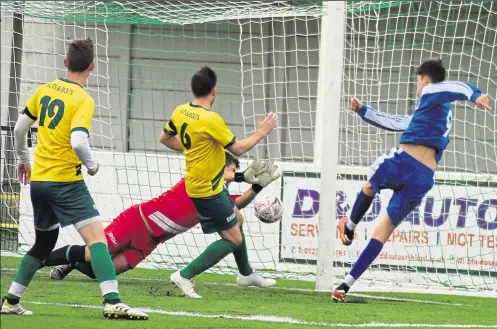  ?? Picture: Tracey Corps ?? Bromley Green Reserves get the ball past Ashford United 3rds keeper Jon Philo at the second attempt