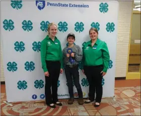  ?? SUBMITTED PHOTOS — KELLY WEISNER ?? Top Potato Judge in the state was Lehigh County 4-H member, Konnor Weisner, Lenhartsvi­lle, center, with two State 4-H Council members.