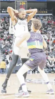  ?? LAYNE MURDOCH JR./AGENCE FRANCE-PRESSE ?? KEVIN Durant of the Brookyln Nets tries to figure out the tight-guarding Dyson Daniels of the New Orleans Pelicans in their NBA game yesterday. Durant fired 33 points and led the Nets to a 108-102 win.