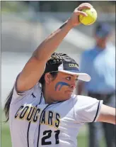  ?? Katharine Lotze/The Signal) ?? College of the Canyons’ pitcher Alexis Ramirez (21) throws a pitch against Glendale Tuesday.