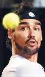  ?? MAX ROSSI / REUTERS ?? Fabio Fognini eyes a shot during his Rome Masters upset win over world No 1 Andy Murray on Tuesday.