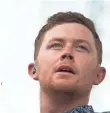 ??  ?? Scotty McCreery could hang his career on “5 More Minutes,” written after the death of his grandfathe­r.