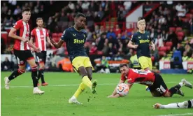  ?? Danehouse/Getty Images ?? Alexander Isak scores Newcastle’s eighth goal at Sheffield United. Photograph: James Gill/