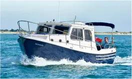  ?? ?? The Trusty T23 has an enclosed wheelhouse, sleeps up to four and is easy to handle, making her ideal for solid offshore cruising