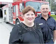  ?? CHERYL CLOCK/POSTMEDIA NEWS ?? Michelle Pharand, therapist with The Arson Prevention Program for Children, and Captain Vince Giovannini, fire prevention officer, are both passionate about helping kids who play with fire, or set fires. They travel across Ontario, teaching other fire...