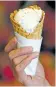  ??  ?? A pecan ice cream cone at Paleteria y Neveria Oasis.