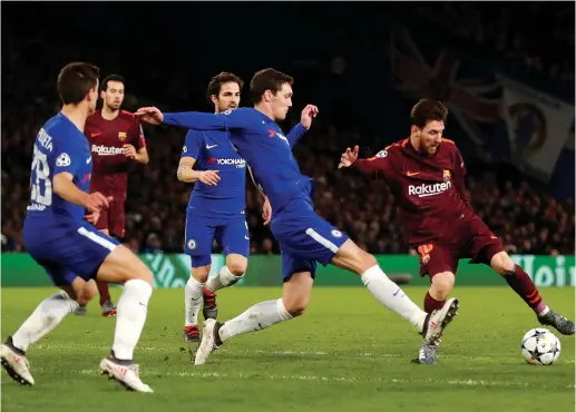  ?? (Reuters) ?? CHELSEA’S ANDREAS CHRISTENSE­N and Barcelona’s Lionel Messi in action during a Champions League game at Stamford Bridge, London, in February.