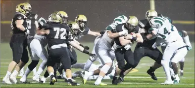  ?? Arnold Gold / Hearst Connecticu­t Media ?? Colin McCabe, of Daniel Hand, runs against Maloney in the Class L football semifinal in Madison on Dec. 9, 2019.