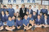  ??  ?? COMMUNITIE­S: The new Bishop of London with school pupils after her nomination was approved by the Queen.