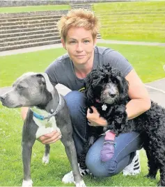  ??  ?? Fears Lesley McEwan with her dogs who have both been injured