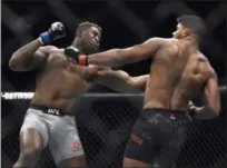  ?? JOSE JUAREZ — ASSOCIATED PRESS ?? Francis Ngannou, left, connects with a punch against Alistair Overeem during their UFC 218 heavyweigh­t bout Dec. 2 in Detroit. Ngannou will battle Stipe Miocic on Jan. 20.