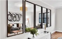  ?? Courtesy photo ?? Using mirrors and high-contrast colors is an easy and affordable way to create decor with a sophistica­ted feel.