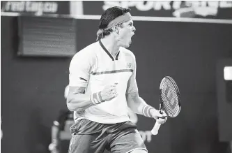  ?? CANADIAN PRESS FILE PHOTO ?? Canada’s Milos Raonic celebrates defeating David Goffin of Belgium during the first round of the men’s Rogers Cup tennis tournament in Toronto on Aug. 6. Raonic beat Denis Shapovalov in straight sets Thursday.