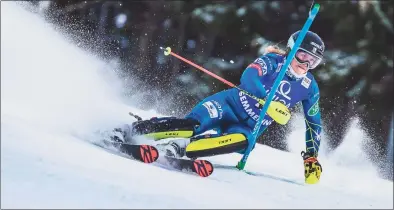  ?? Dominik Angerer / EXPA / AFP via Getty Images ?? The USA’s Paula Moltzan competes during her first run of the FIS Alpine Ski Women’s Slalom World Cup event at the panorama slope in Semmering, Austria, on Tuesday.