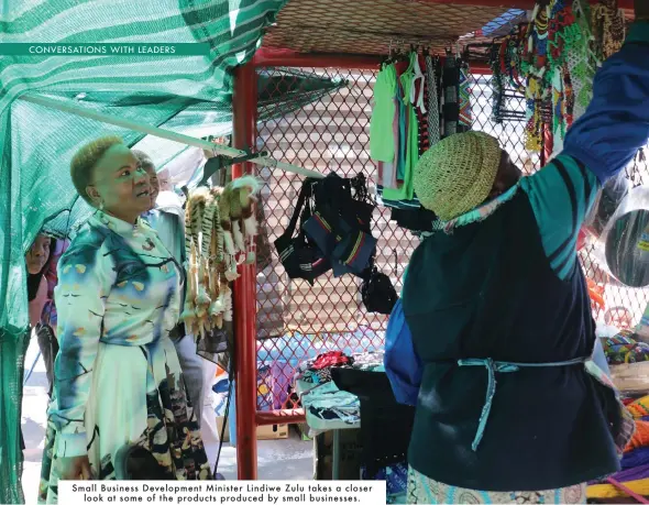  ??  ?? Small Business Developmen­t Minister Lindiwe Zulu takes a closerlook at some of the products produced by small businesses.