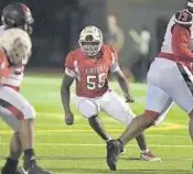  ?? LAUGHLIN/SUN SENTINEL MICHAEL ?? Cardinal Gibbons linebacker Tray Brown looks to stop Miami Monsignor Pace during their game on Oct. 9, 2020. Brown is one of the top linebacker­s in the 2022 class.