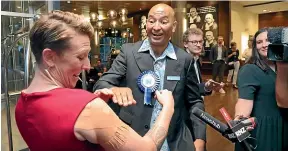  ?? MARK TAYLOR/STUFF ?? Labour’s Georgie Dansey meets Tama Potaka (National) after his win in the Hamilton West by-election.