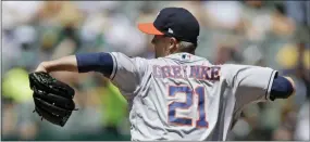  ?? BEN MARGOT — THE ASSOCIATED PRESS ?? Astros pitcher Zack Greinke delievers against the Athletics in the first inning of a game Sunday in Oakland, Calif.