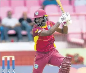  ?? CWI MEDIA PHOTO/ RANDY BROOKS ?? West Indies batsman Sharmarh Brooks hits a four during their first One Day Internatio­nal cricket match against Bangladesh at the National Stadium in Providence, Guyana yesterday.