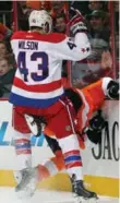  ??  ?? Caps’ Tom Wilson nailed Flyer Brayden Schenn into the boards, but the NHL bought his explanatio­n.