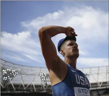  ?? TIM IRELAND — THE ASSOCIATED PRESS FILE ?? United States’ Trey Hardee prepares to compete in the Decathlon shot put during the World Athletics Championsh­ips in London in 2017.