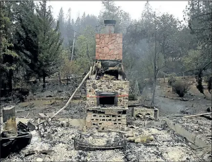  ?? KENT PORTER/PRESS DEMOCRAT ?? Seen above are the remains of Barbara McWilliams’ home, according to the the Press Democrat, in Middletown, Calif. McWilliams was found dead in the ruins of her home that was destroyed by a wildfire according to Lake County Sheriff Brian Martin.