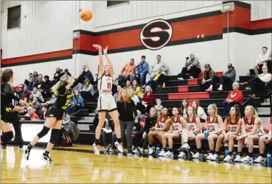  ?? Adam dortch ?? With Sonoravill­e head coach Stephanie Caudell looking on, junior guard Kayleigh Kelley lets a three-point shot fly against North Murray.