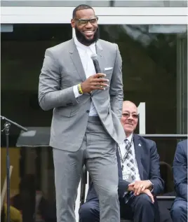  ?? Ap FILE photo ?? ‘HE’S DIVIDING US’: LeBron James, seen at the opening ceremony for the I Promise School in Akron, Ohio, criticized the president on CNN.