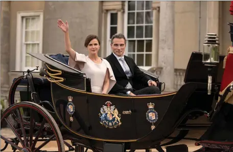  ?? ALEX BAILEY — NETFLIX/TNS ?? Keri Russell, left, and Rufus Sewell in a scene from “The Diplomat.”